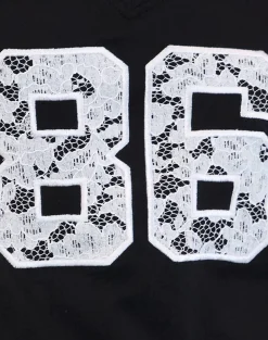 Motel Rocks Printed Tops | Tees-Blaine Oversized Tee in Black with 86 White Lace Embroidery