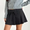Motel Rocks Tailoring | Pleated Skirts-Calina Pleated Mini Skirt in Black Pinstripe