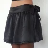 Motel Rocks Basics-Habema Wrap Mini Skirt in Satin Black