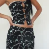 Motel Rocks Co-Ords | Printed Tops-Lacur Bandeau Corset in Black with Pearl and Bow Print