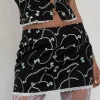 Motel Rocks Co-Ords | A Line Skirts-Molen Mini Skirt in Black with Pearl and Bow Print