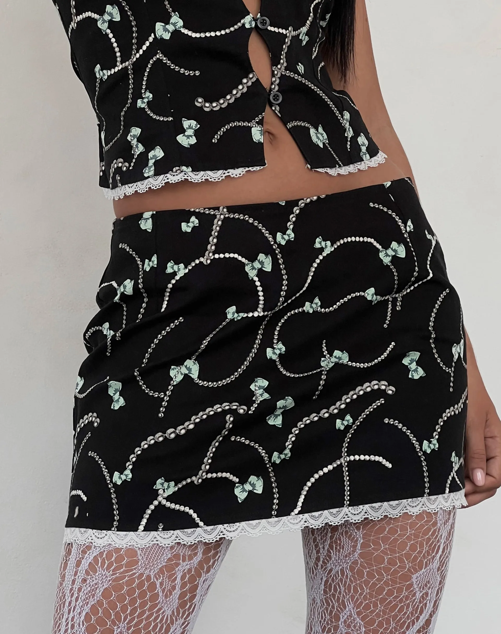 Motel Rocks Co-Ords | A Line Skirts-Molen Mini Skirt in Black with Pearl and Bow Print