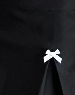 Motel Rocks Tailoring | Co-Ords-Ropita Mini Skirt in Black with Ivory Bows