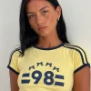 Motel Rocks Printed Tops | Tees-Salda Tee in Lemonade with Navy Binding and '98' Emb LemonadewithNavyBindingBindingand'98'Emb