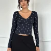 Motel Rocks Printed Tops | Long Sleeve Tops-Salisa Top in Navy with Mini Bow Design