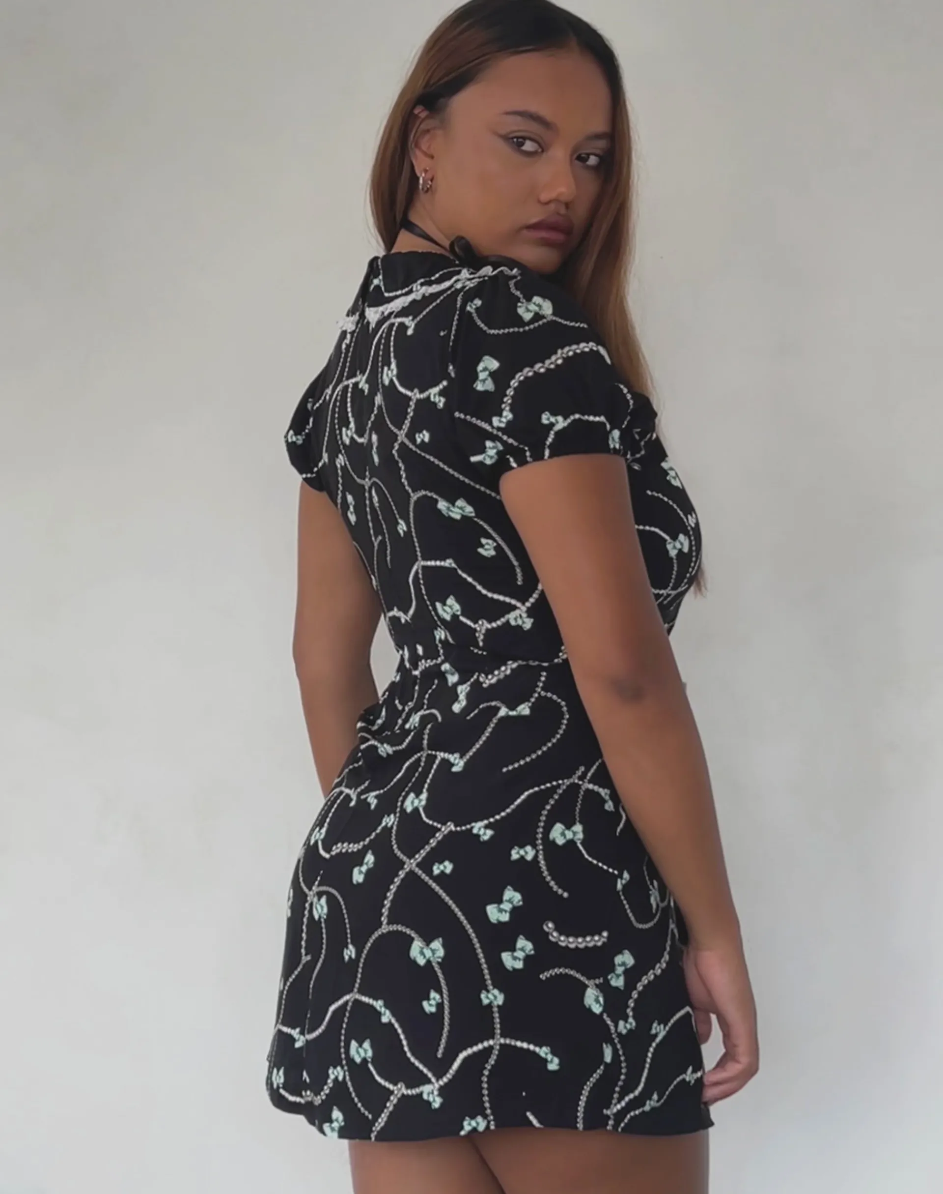 Motel Rocks Printed Dresses | Mini Dresses-Sulani Mini Dress in Black with Pearl and Bow Print